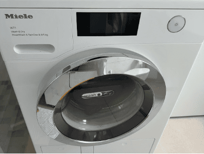 Foto einer reparierten Miele Waschmaschine aus einer Google-Rezension